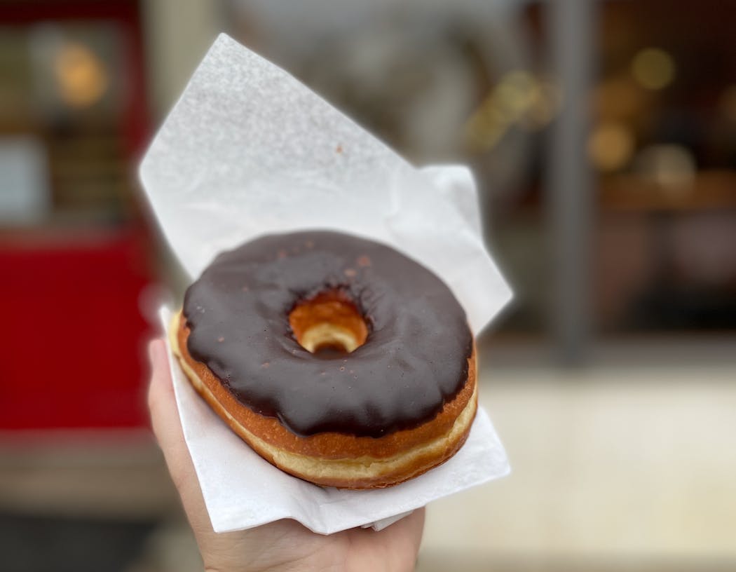 A raised chocolate doughnut is the kind of treat you never grow out of.