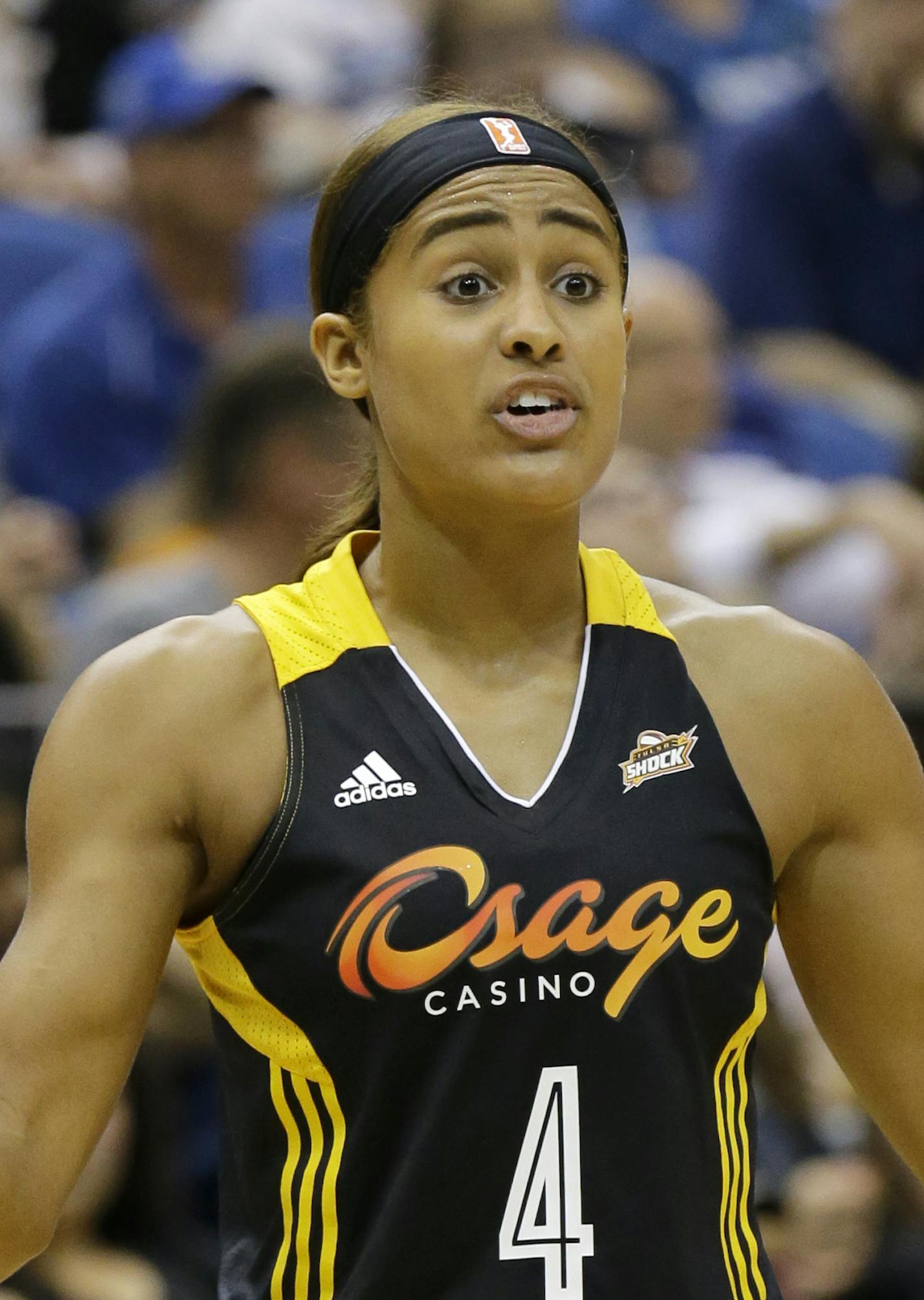 Tulsa Shock guard Skylar Diggins (4) gestures to teammates during the first half of a WNBA basketball game against the Minnesota Lynx in Minneapolis, Friday, June 5, 2015. (AP Photo/Ann Heisenfelt) ORG XMIT: MIN2015062017514185
