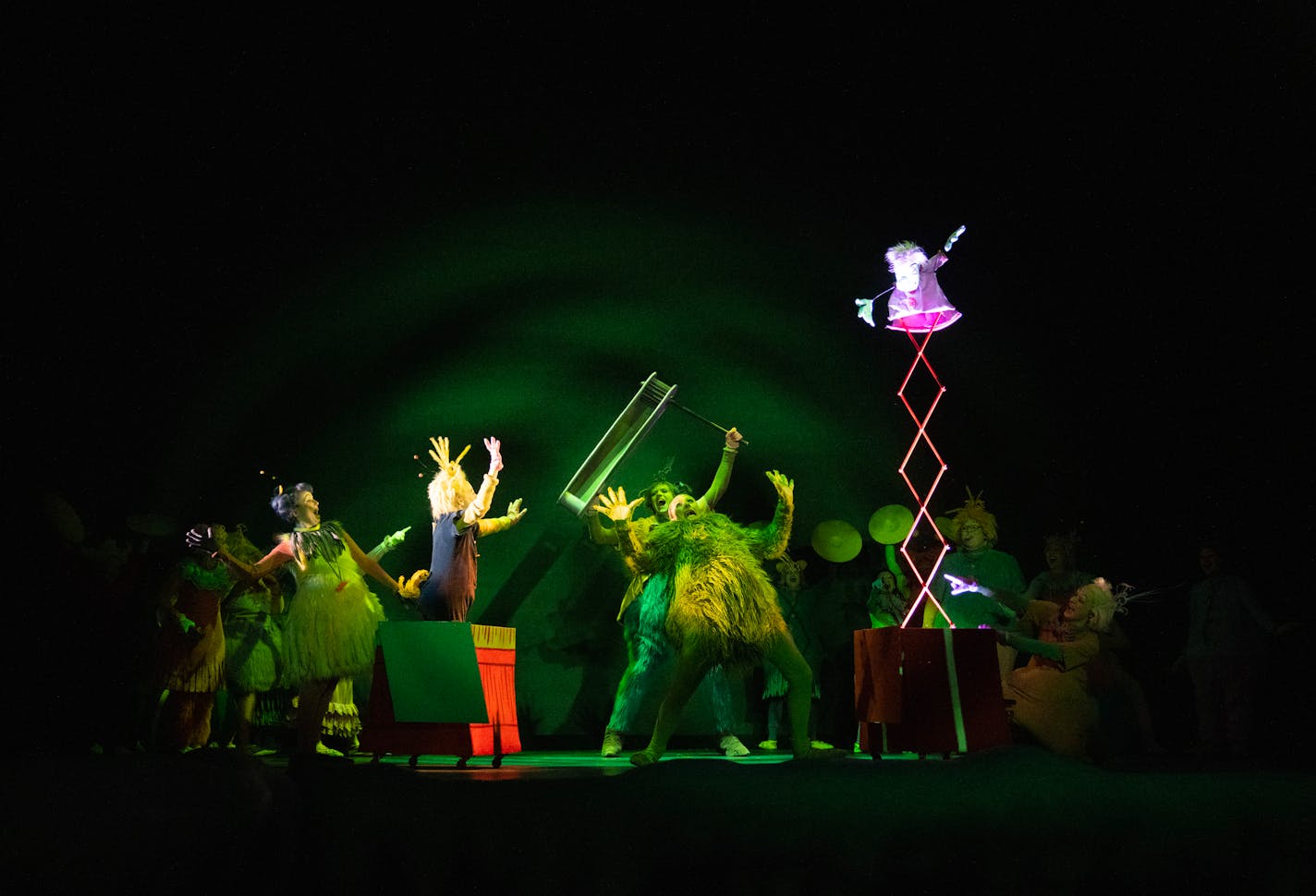 Keegan Robinson, playing the "Grinch double," rehearses on stage Thursday, Nov. 02, 2023, at the Children's Theatre in Minneapolis, Minn. ]