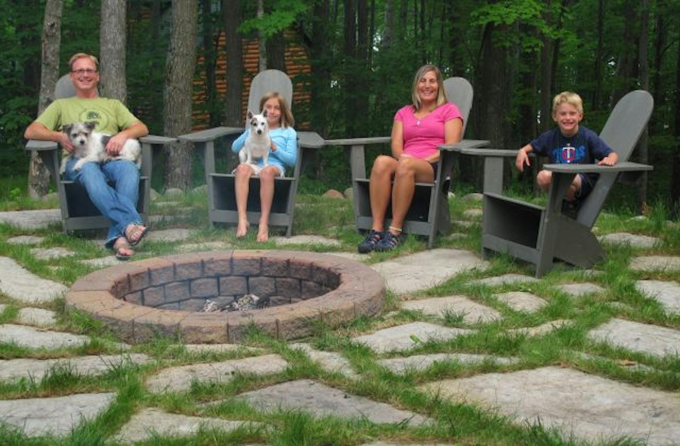 Jay DeWitt, with Missy Walz Dierks and children Bailee Dierks and Eli Dierks at their Cumberland, Wi. lake home