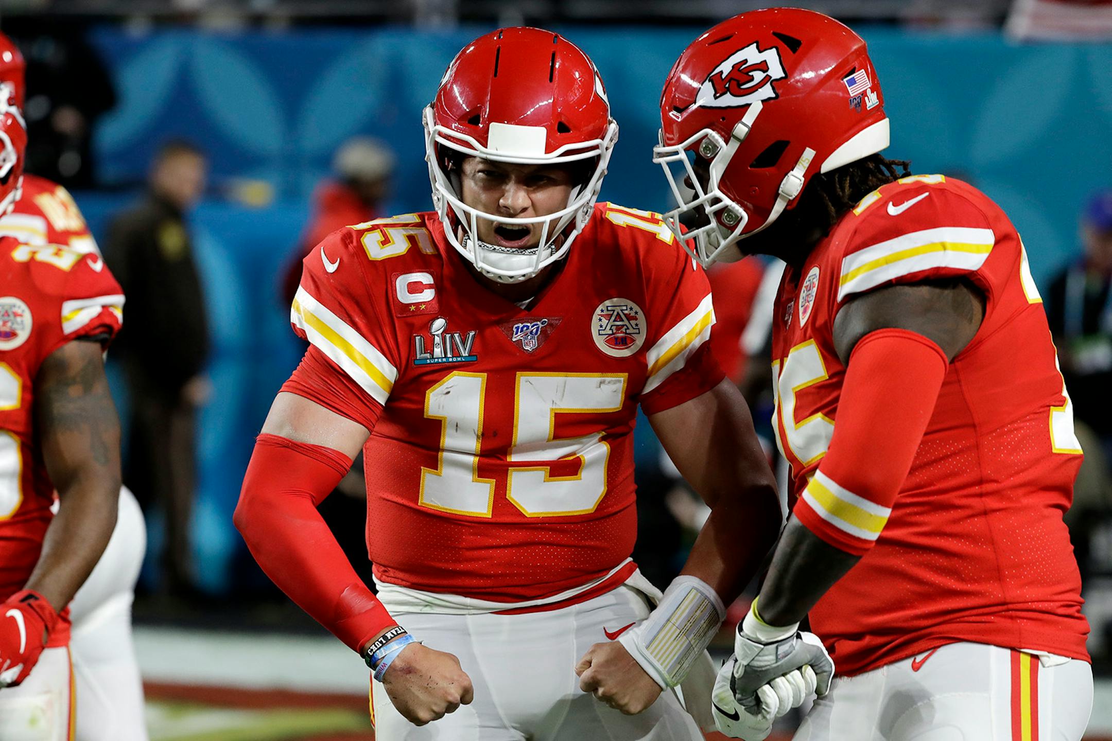 Kansas City Chiefs quarterback Patrick Mahomes (15) celebrates after scoring against the San Francisco 49ers during the first half of the NFL Super Bowl 54 football game Sunday, Feb. 2, 2020, in Miami Gardens, Fla.