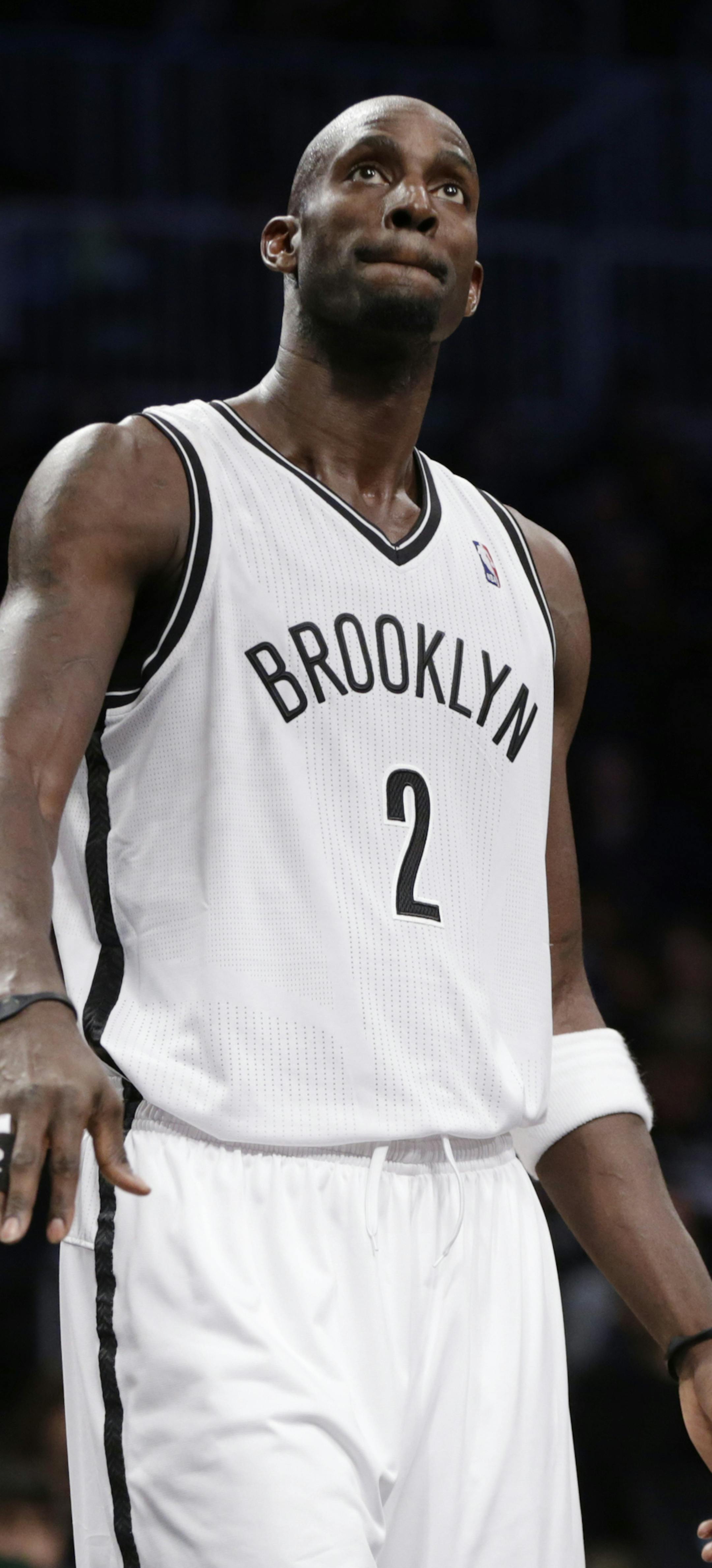 Brooklyn Nets forward Kevin Garnett (2) looks toward the basket in the second half of their NBA basketball game against the Detroit Pistons, Sunday, Nov. 24, 2013 in New York. (AP Photo/Kathy Willens) ORG XMIT: NYOTK