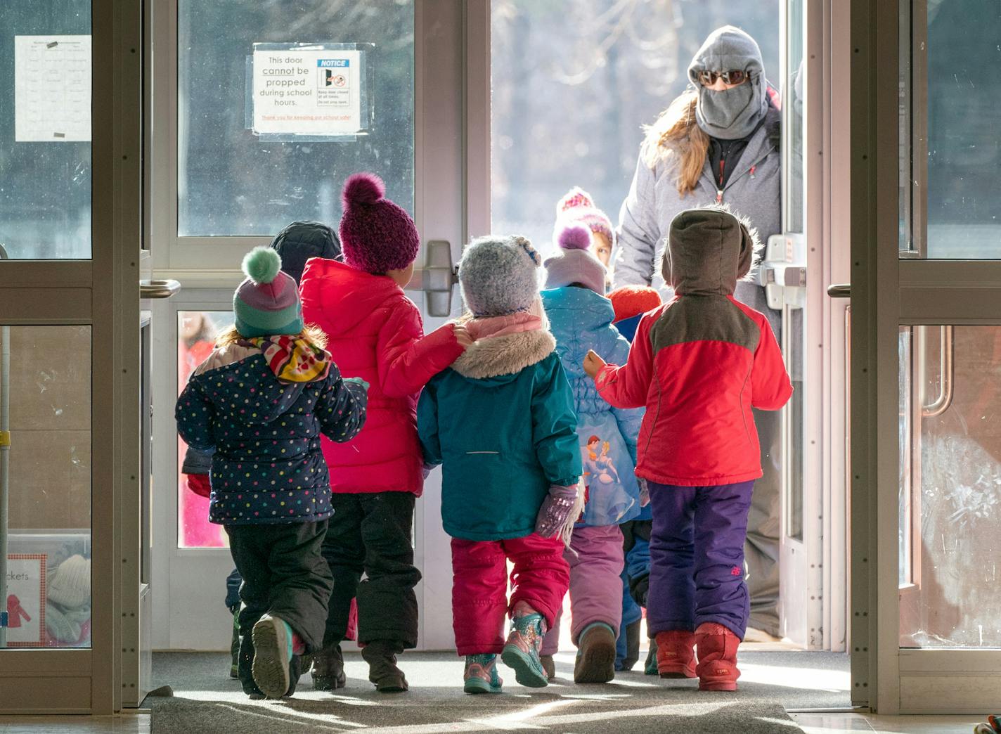 Recess at Woodson Kindergarten Center means kids suit up in hats, jackets, boots and snow pants. ] GLEN STUBBE &#x2022; glen.stubbe@startribune.com Friday, January 11, 2019 In the last decade, all-day kindergarten has become just about universal across Minnesota, as policymakers and educators have touted its benefits for young learners. In Austin, one school has long been ahead of the curve: the Woodson Kindergarten Center, an all-kindergarten school with about 400 students in Austin, MN. We vis