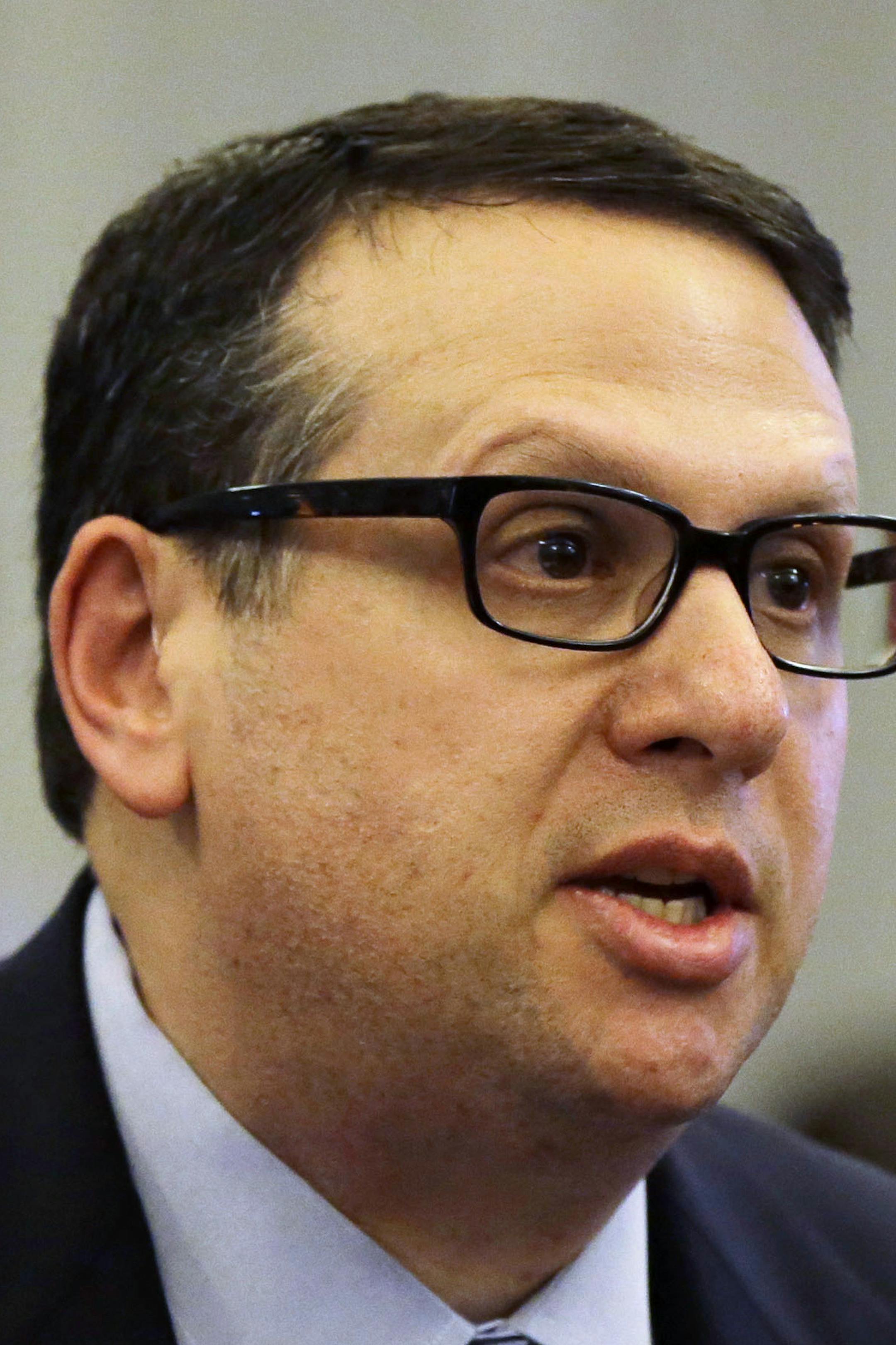In this Jan. 9, 2014, photo, David Wildstein speaks during a hearing at the Statehouse in Trenton. Wildstein, a former appointee of Gov. Chris Christie, is refusing to answer questions from a legislative committee looking into a scandal involving punitive traffic lane closures. The Christie administration stands accused of closing lanes on the George Washington Bridge, linking New York and New Jersey, in order to create a huge traffic backup as retribution against a local mayor for not endorsing