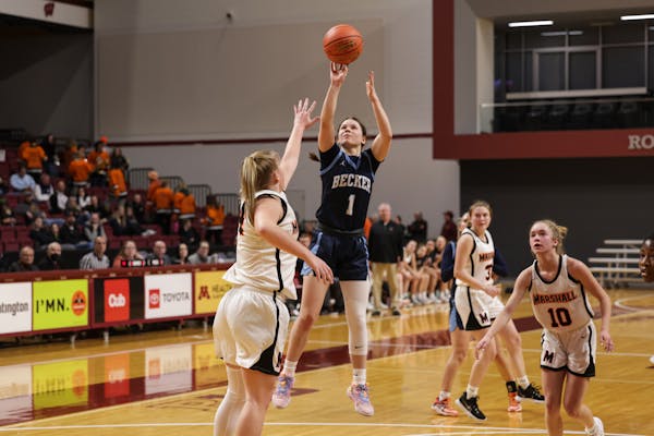 Becker's Maren Westin puts the ball up in the second half. Photo by Cheryl A. Myers, SportsEngine