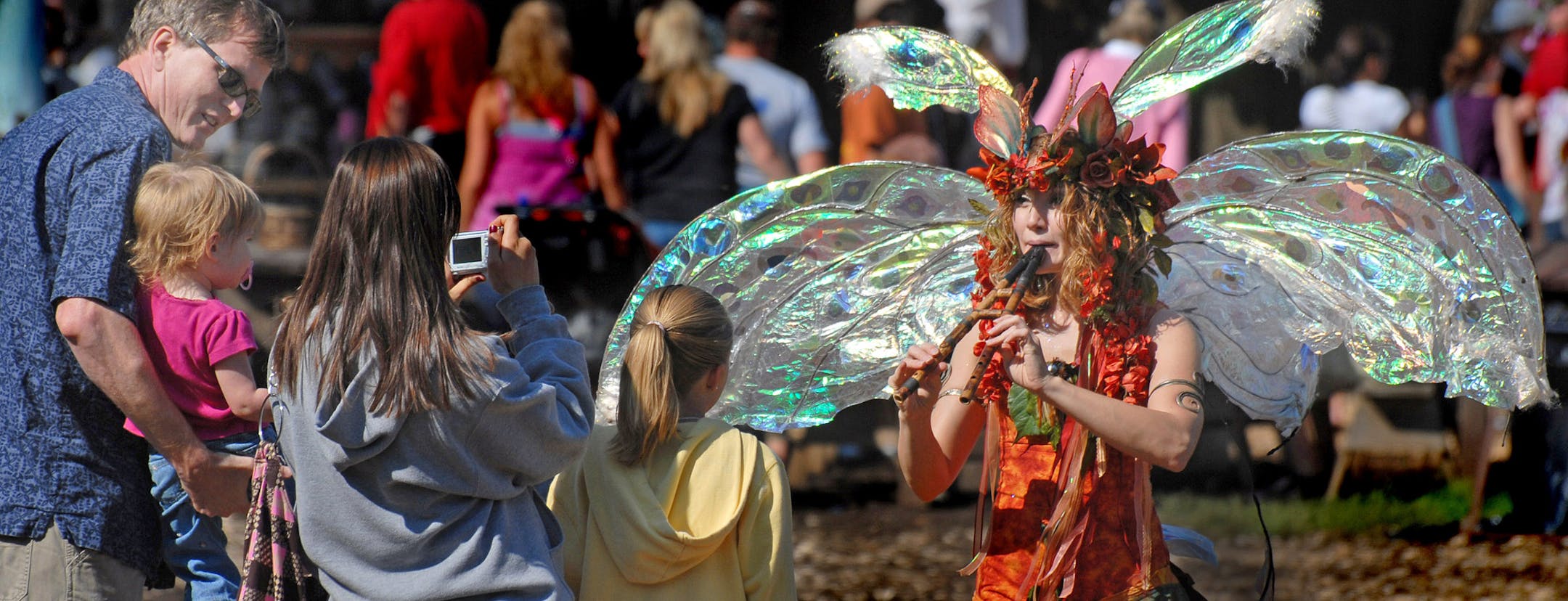 Richard Sennott¬•rsennott@startribune.com] Shakope, Mn. Saturday 8/22/ The Minnesota Renaissance Fair opening day. Twig the fairy plays a tune on her flute on the opening day of the Minnesota Renaissance Fair. ORG XMIT: MIN2013051019252821