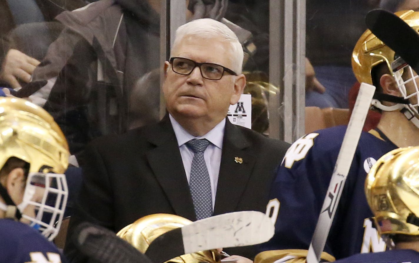 Notre Dame head coach Jeff Jackson looks on from the bench during the first period of an NCAA regional men's college hockey tournament game against Minnesota, Saturday, March 25, 2017 in Manchester, N.H. Notre Dame won 3-2. (AP Photo/Mary Schwalm) ORG XMIT: NHMS126