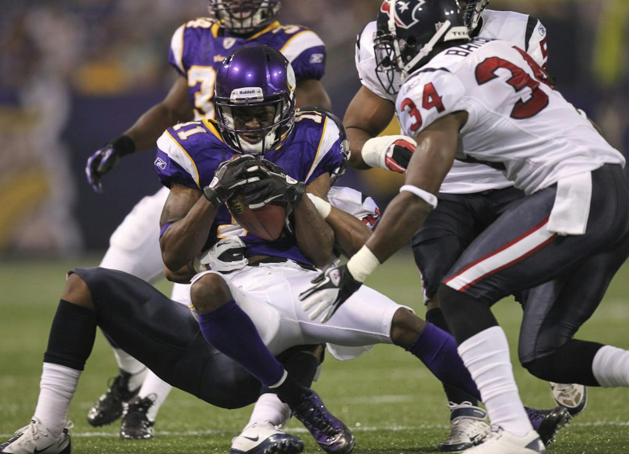 Wide receiver Jaymar Johnson of the Vikings held onto an 11 yard reception in the second quarter Thursday night. The Vikings met the Houston Texans in their final preseason game Thursday night, September 1, 2011 at Mall of America Field at the Metrodome in Minneapolis, Minn.
