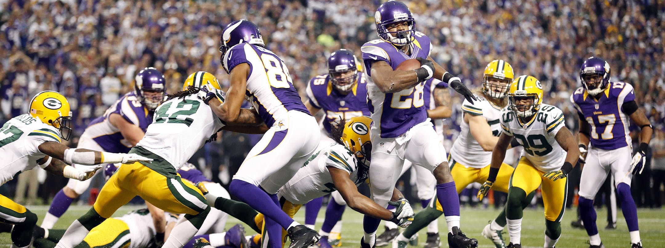 Vikings running back Adrian Peterson (28) ran in for a touchdown in the first quarter. ] CARLOS GONZALEZ cgonzalez@startribune.com - December 30, 2012 ‚Äì Mall of America Field ‚Äì The Metrodome - Minneapolis, Minn, NFL, Minnesota Vikings vs. Green Bay Packers