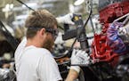 Sean Cumberledge assembles a Mack Truck at the company's plant in Macungie, Pa., Aug. 29, 2017. Mack Truck employs about 1,800 people in the Pennsylva
