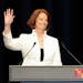 Australian Prime Minister Julia Gillard, leader of the Australian Labor Party waves to the crowd during her post election speech in Melbourne, Saturda