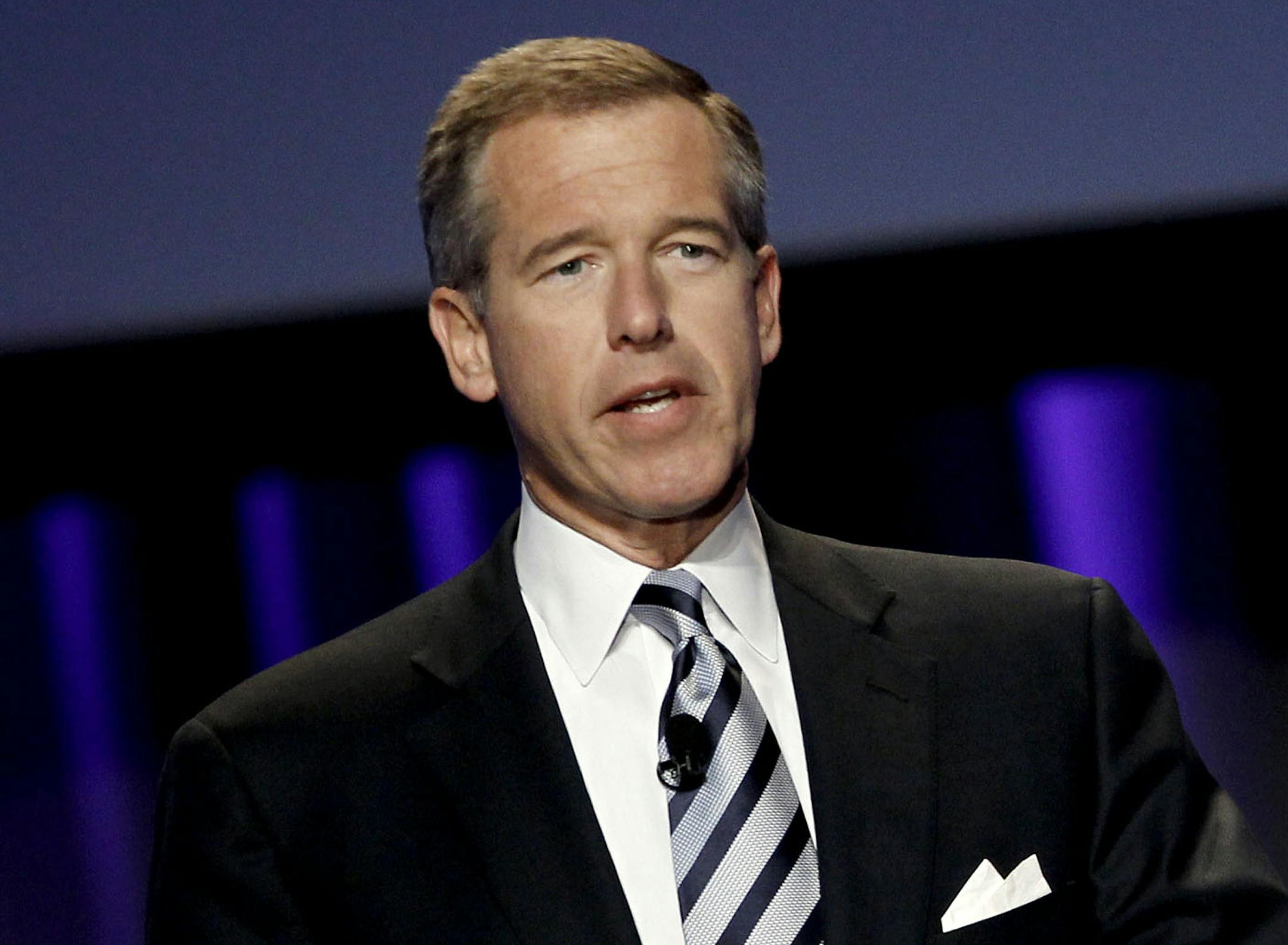 FILE - In this Oct. 26, 2010 file photo, Brian Williams, then anchor and managing editor of "NBC Nightly News," speaks at the Women's Conference in Long Beach, Calif. A threat of violence against Los Angeles schools brought Williams back on-air for NBC News. In his first appearance since losing his anchor job, Williams handled a NBC News special report Tuesday, Dec. 15, 2015, on the closure of LA public schools. (AP Photo/Matt Sayles, File)