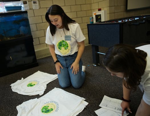 Mia Carriedo made T-shirts promoting sustainability at the School of Environmental Studies in Apple Valley, which achieved LEED Gold certification in April.