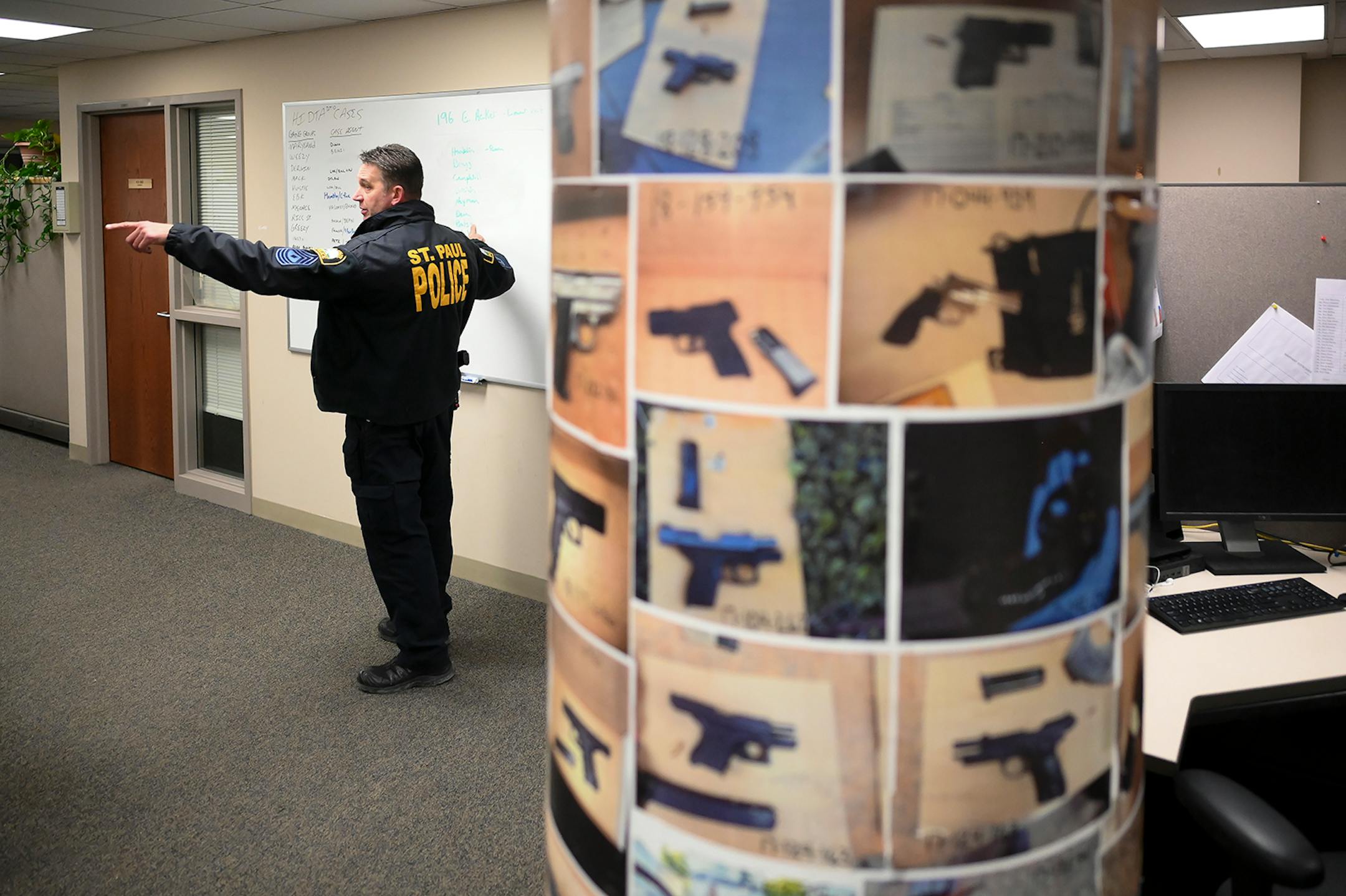 St. Paul Police Sgt. Shawn Campbell briefed members of the department's gang unit before they executing a warrant while searching for evidence Wednesday night related to a recent shooting.