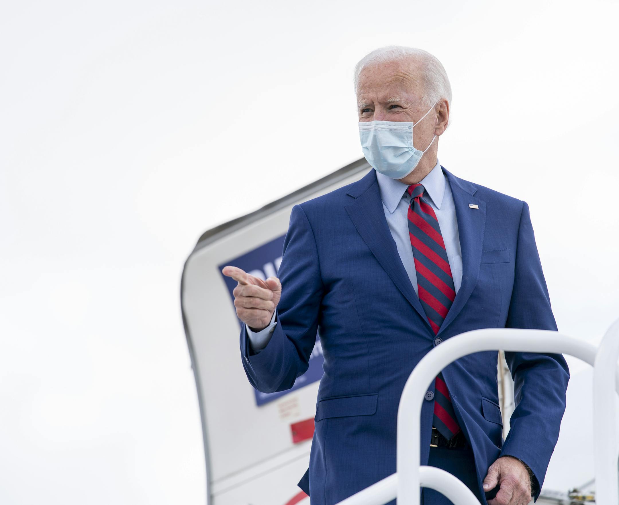 Democratic presidential candidate former Vice President Joe Biden boards his campaign plane at New Castle Airport in New Castle, Del., Monday, Oct. 5, 2020, to travel to Miami for campaign events. (AP Photo/Andrew Harnik)