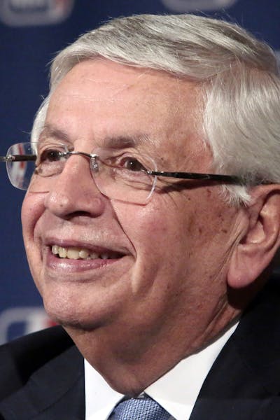 FILE - In this undated, file photo, NBA Commissioner David Stern smiles during a news conference after an NBA board of governors meeting Wednesday, Oc