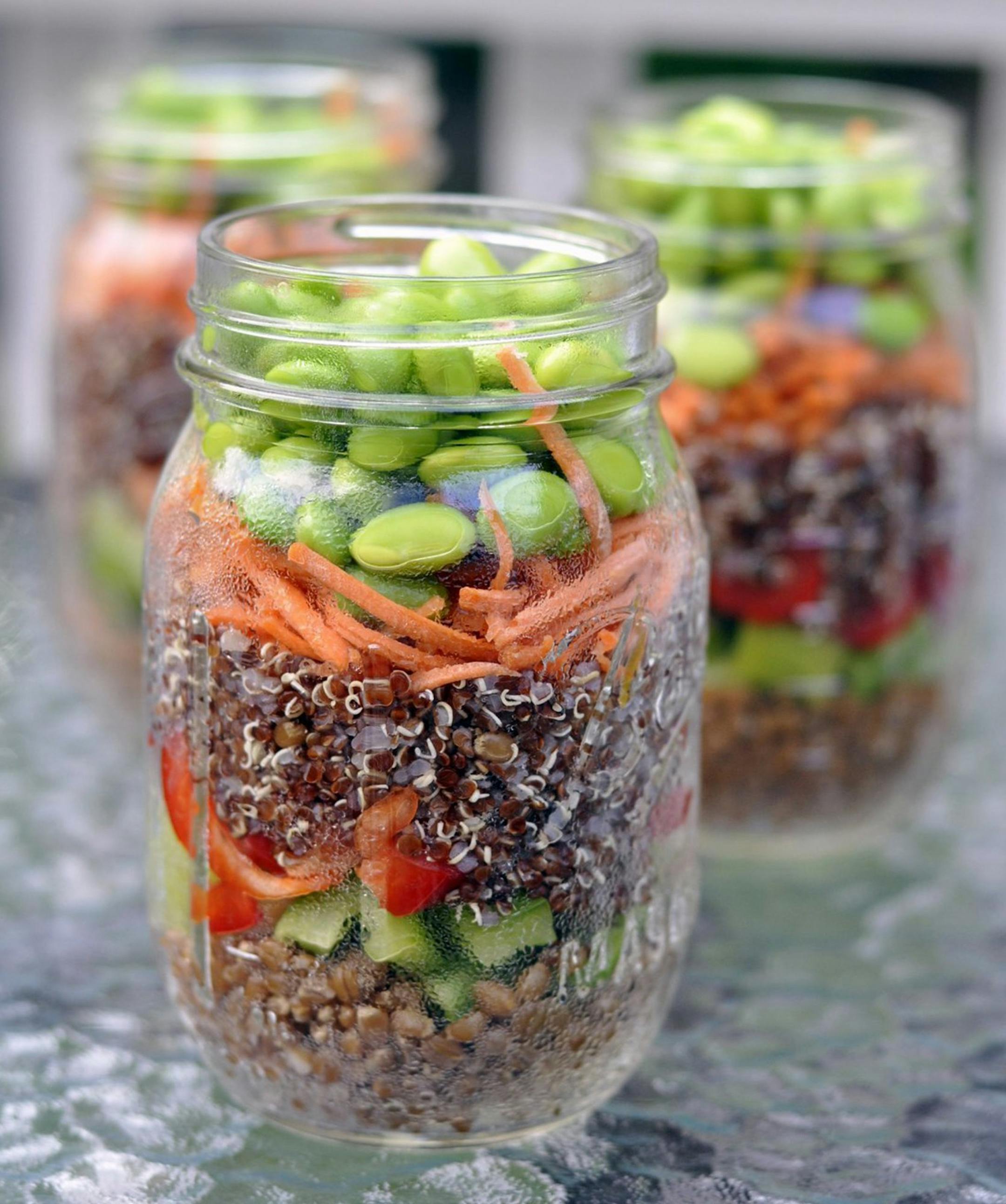 Quinoa, edamame and orange-ginger dressing jazz up this seven-layer salad. (Brenton Gospodarek/MCT) ORG XMIT: 1156135