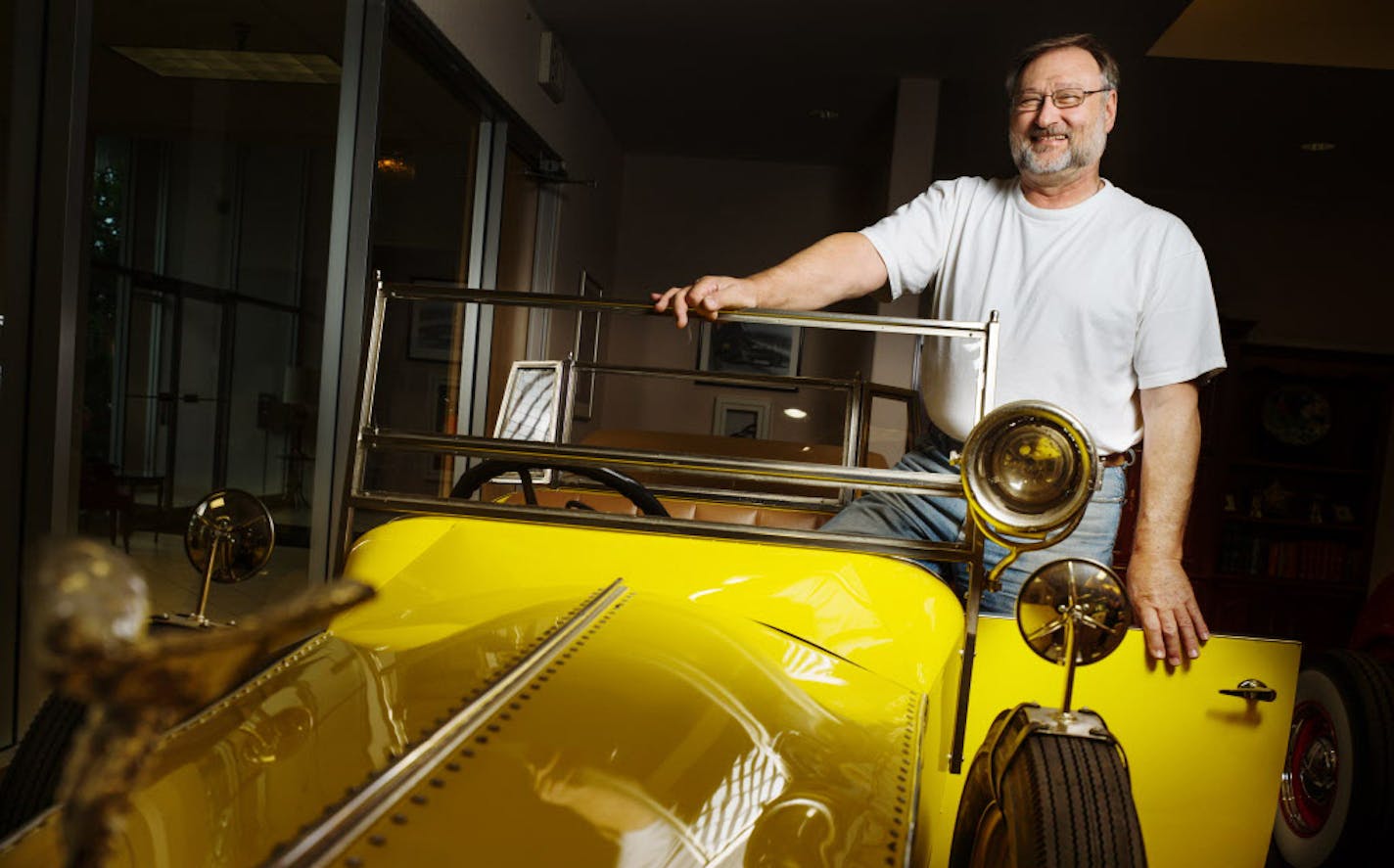 Linus Vlatkovich with one of his favorite props, a 1925 Rolls-Royce created for the Guthrie's 2006 staging of "The Great Gatsby."