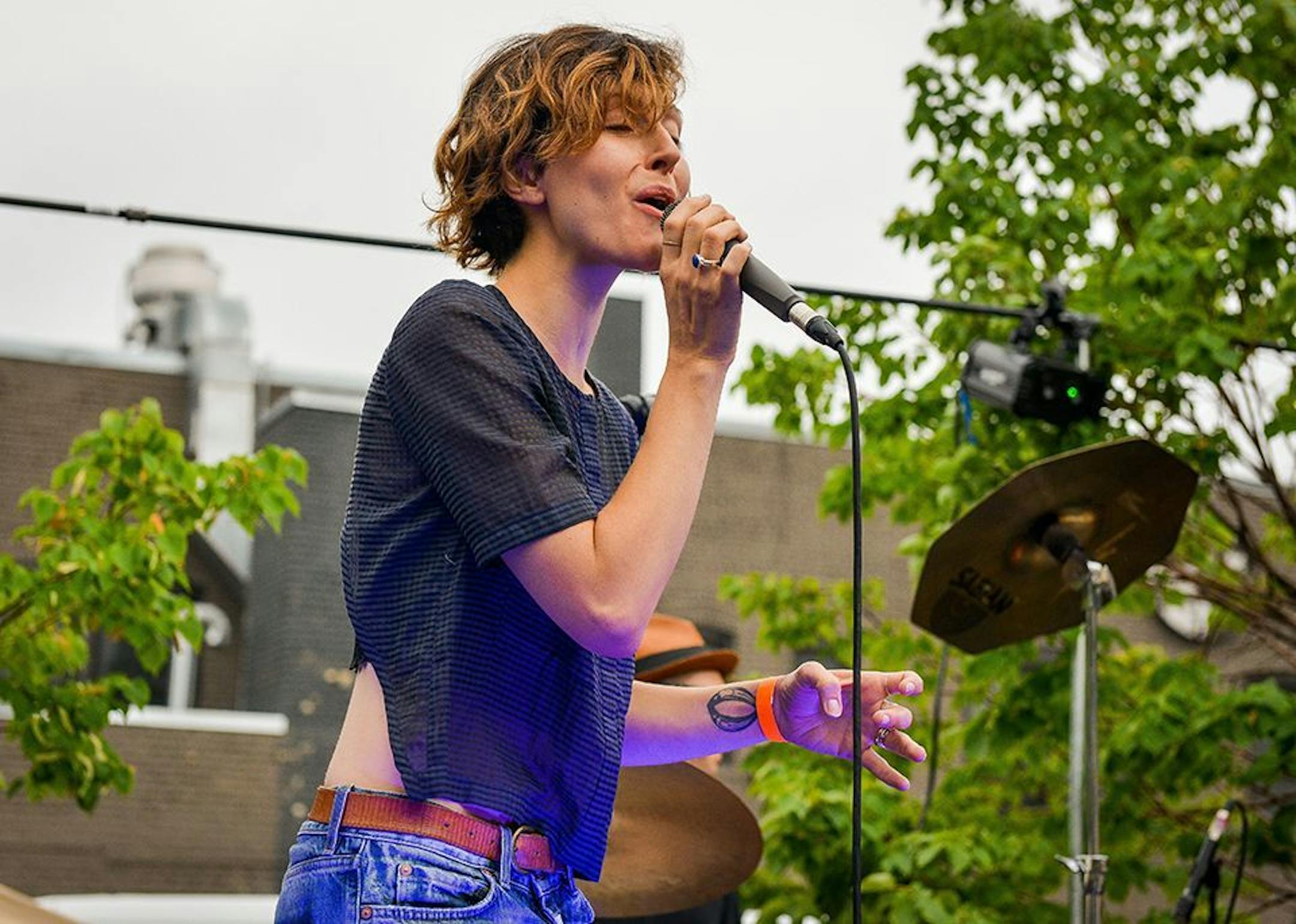 Channy Leaneagh singing during Warey's first official gig at the Totally Gross National Product party outside Icehouse in August.