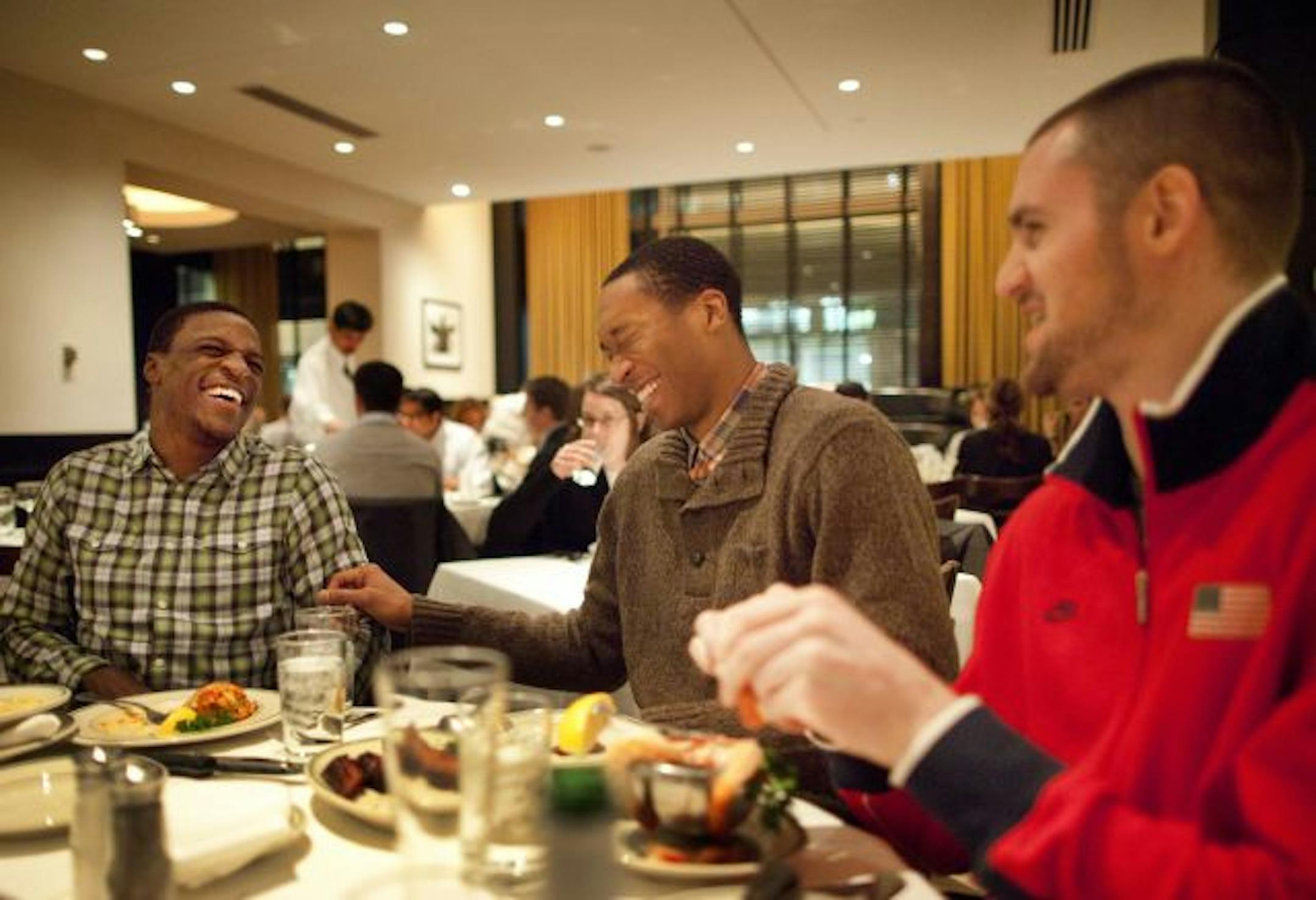 From left, Jonny Flynn, Wes Johnson and Kevin Love, all young players for the Minnesota Timberwolves, joked around at Manny's Steakhouse in Minneapolis.