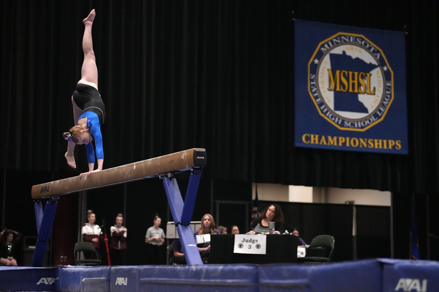 Jackie Bergeron of St. Michael-Albertville competes in the balance beam during the Minnesota State High School League Class 2A gymnastics championships Friday, Feb. 24, 2023 at the Roy Wilkins Auditorium in St. Paul, Minn. ] ANTHONY SOUFFLE • anthony.souffle@startribune.com