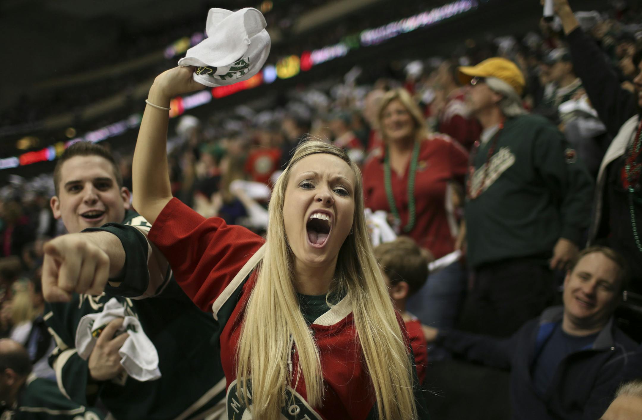 The Minnesota Wild beat the Chicago Black Hawks 3-2 in overtime in game three of their first round playoff series Sunday afternoon, May 25, 2013 at Xcel Energy Center in St. Paul. Happy Wild fans got wild in the third period, shortly before Chicago tied the game to force overtime. ] JEFF WHEELER ‚Ä¢ jeff.wheeler@startribune.com