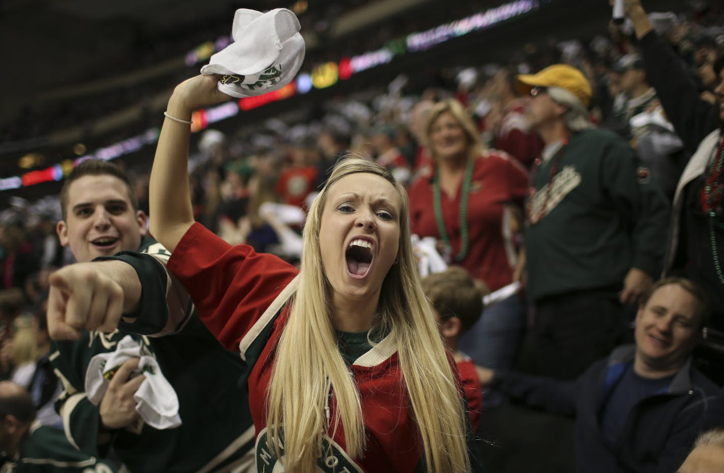 The Minnesota Wild beat the Chicago Black Hawks 3-2 in overtime in game three of their first round playoff series Sunday afternoon, May 25, 2013 at Xcel Energy Center in St. Paul. Happy Wild fans got wild in the third period, shortly before Chicago tied the game to force overtime. ] JEFF WHEELER &#x201a;&#xc4;&#xa2; jeff.wheeler@startribune.com