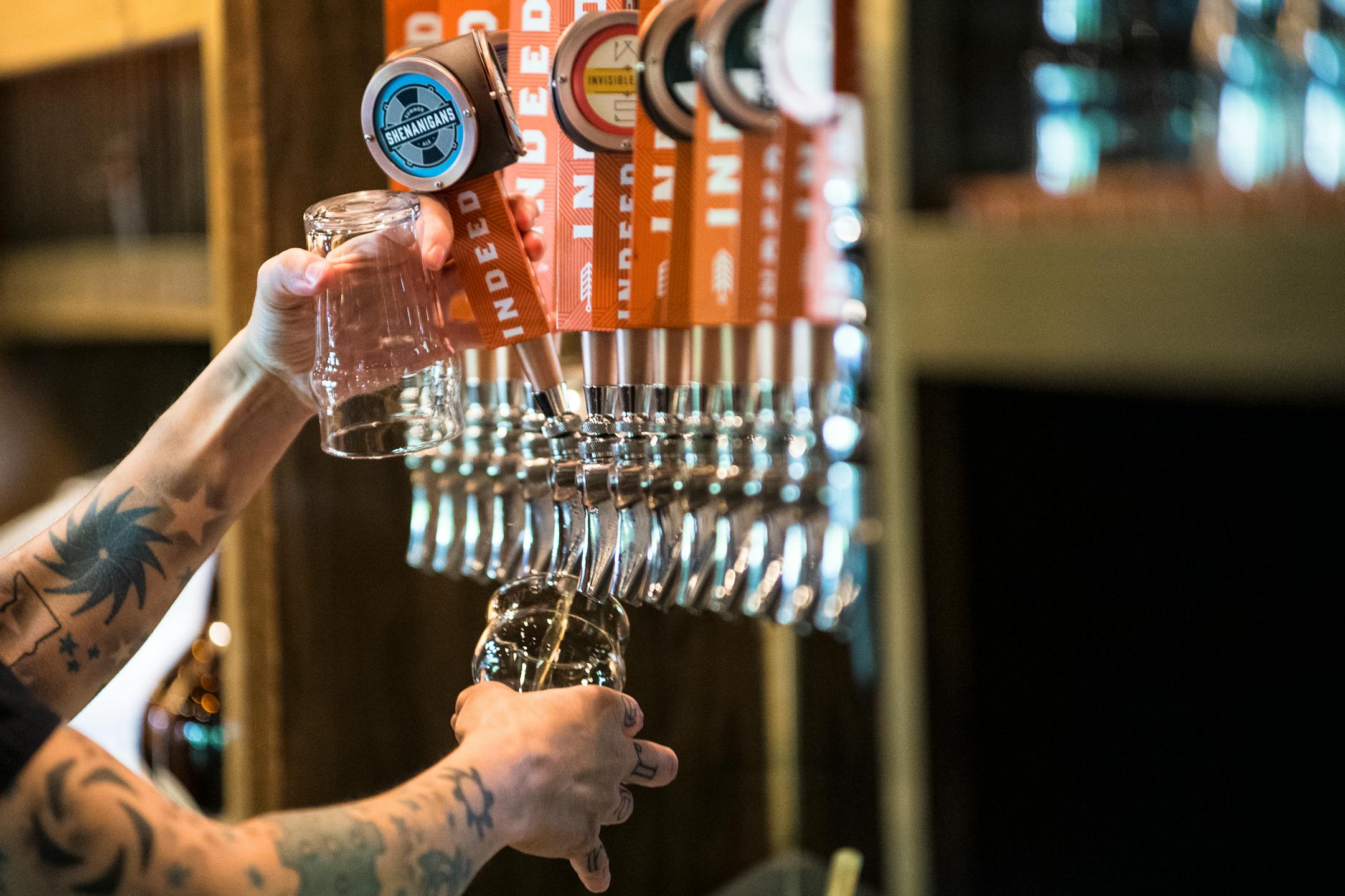 Heather Kraft poured beer for customers Wednesday afternoon.    ] (AARON LAVINSKY/STAR TRIBUNE) aaron.lavinsky@startribune.com  As the craft beer market continues to grow in Minnesota and nationwide, analysts and insiders wonder if it's a Renaissance or a bubble. For now, brewers and customers are showing no signs of a slowdown. We photograph day-to-day operations at Indeed Brewery and the bar at New Bohemia on Wednesday, May 25, 2016 in Minneapolis.