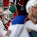 Minnesota Wild goalie John Curry (33) got a hug from Christian Folin (5) at the end of the game. Minnesota beat St. Louis by a final score of 4-2. ] C