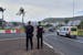FILE - French gendarme patrol at a roundabout in Noumea, New Caledonia, Dec.12, 2021.