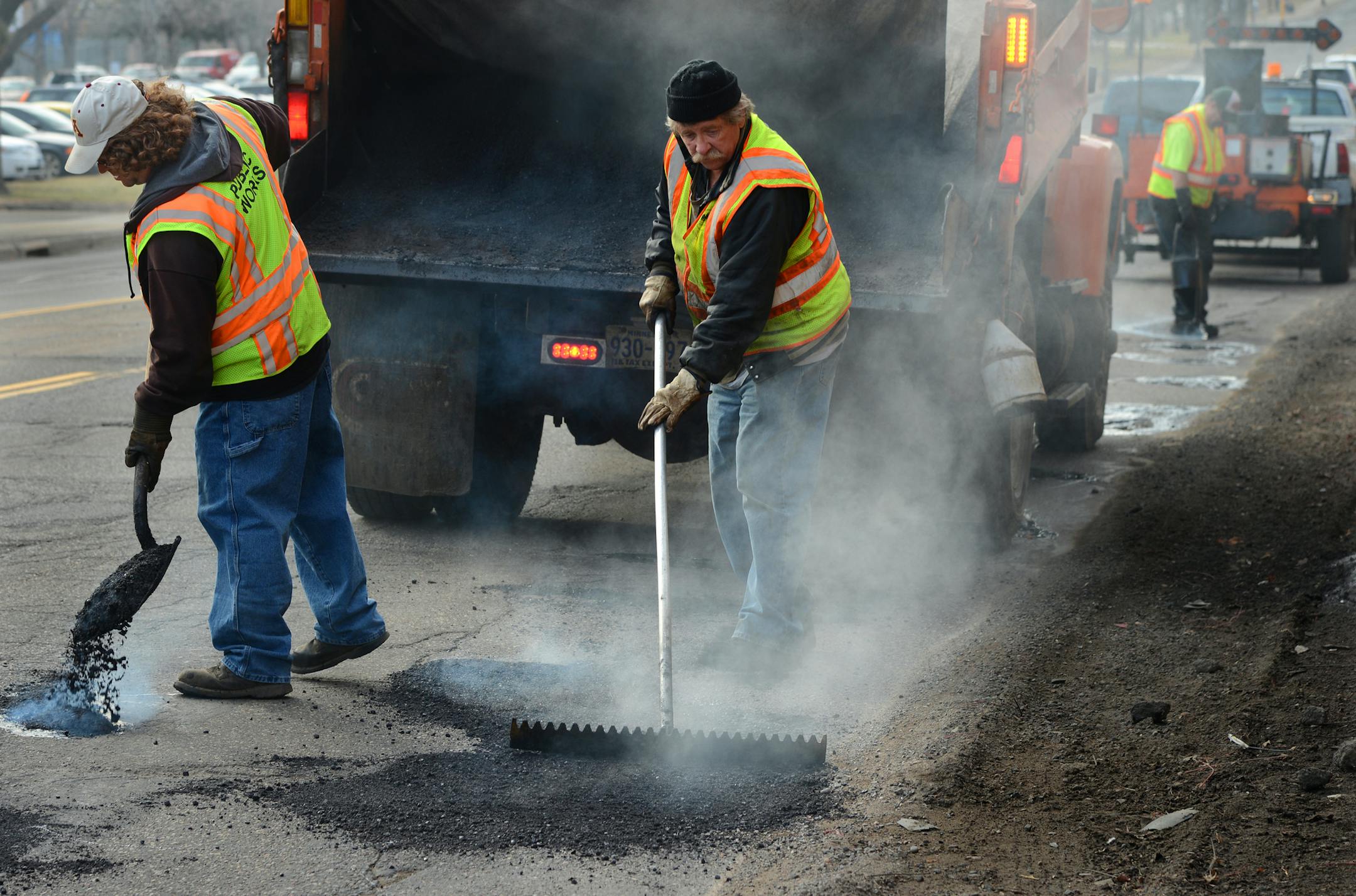 From left to right, Tom Garvey and Rick Wallenberg of St Paul Public Works began the morning filling potholes near the intersection of Robert St. and Fillmore Ave in St Paul. ].St. Paul drivers complain that Third World countries don't have roads like this: Potholed, pockmarked, axel-busting rumble strips that make driving a teeth rattling experience. St. Paul street crews say they are "literally knee deep" in trying to get ahead of the problem this spring. Richard.Sennott@startribune.com Richar