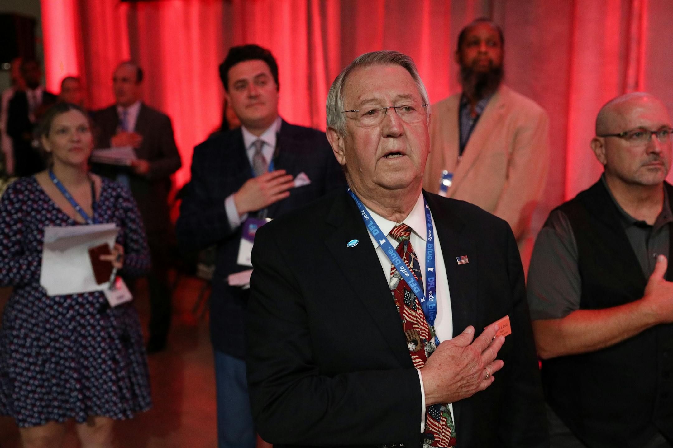 Rochester Mayor Ardell Brede stood for the National Anthem during the DFL State Convention Friday.
