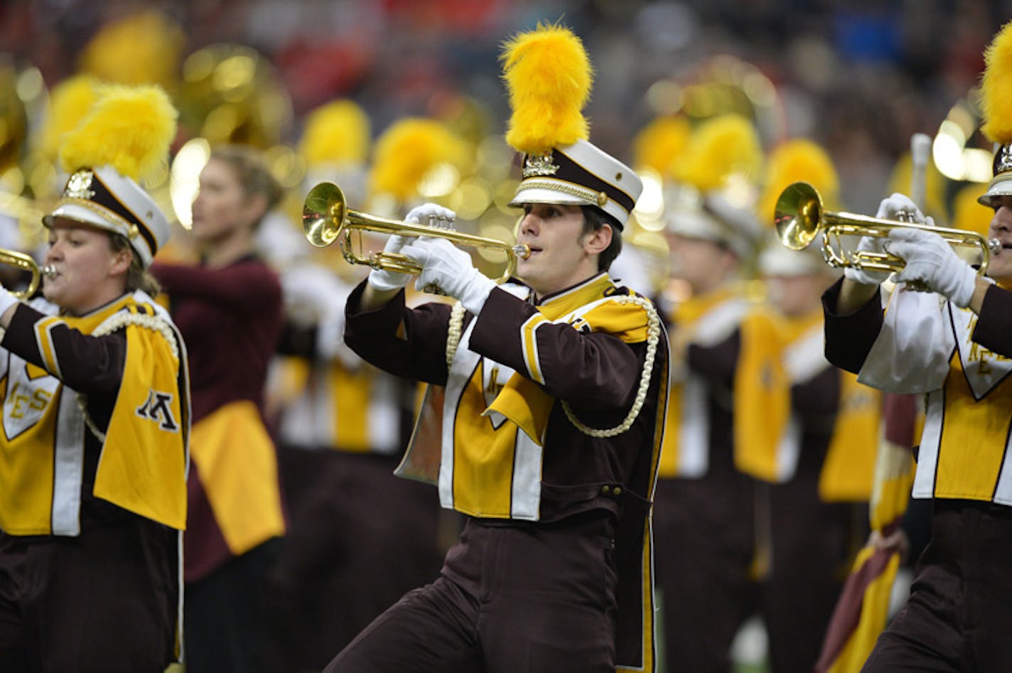 Dec. 28, 2012 - Houston, Texas, USA - December 28, 2012: Minnesota Golden Gophers marching band performing during the Meineke Car Care Bowl of Texas between the University of Minnesota Golden Gophers and the Texas Tech University Red Raiders at Reliant Stadium in Houston, Texas. Texas Tech wins the Meineke Car Care Bowl of Texas against Minnesota, 34-31. (Cal Sport Media via AP Images)