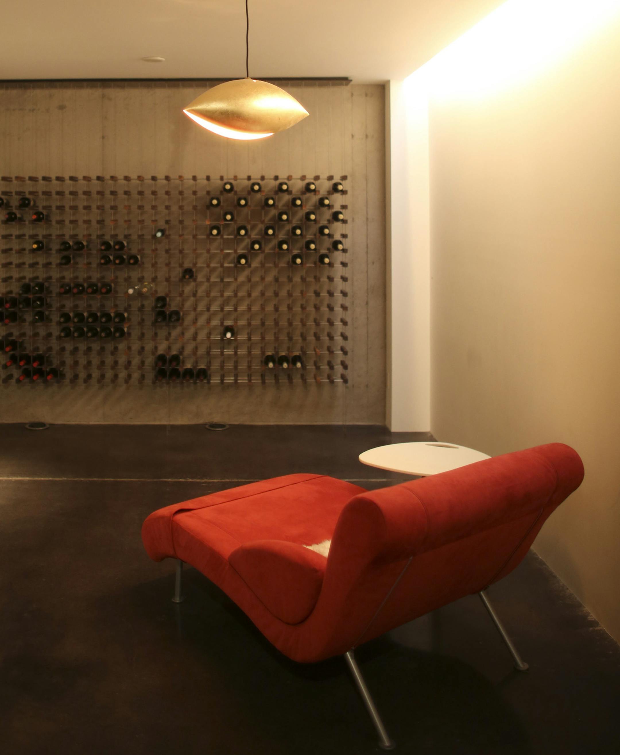 The AIA Home of the Month is a Mediterranean-style home in Minneapolis that was transformed by a seamless sunroom addition and modern interior features by TEA2 Architects. A wine rack fabricated from stainless steel rods and walnut is the centerpiece of the cellar underneath the new sunroom in the Minneapolis home of Kamil Ugurbil and Jutta Ellermann Tuesday evening, August 20, 2013. ] JEFF WHEELER ‚Ä¢ jeff.wheeler@startribune.com