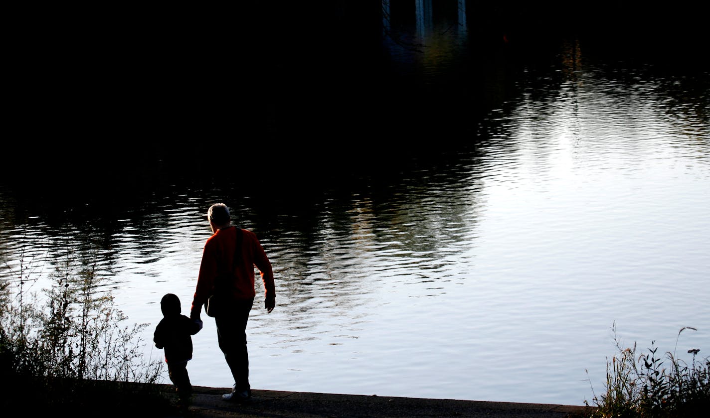 An October walk on a mild day near the water in Powderhorn Park.