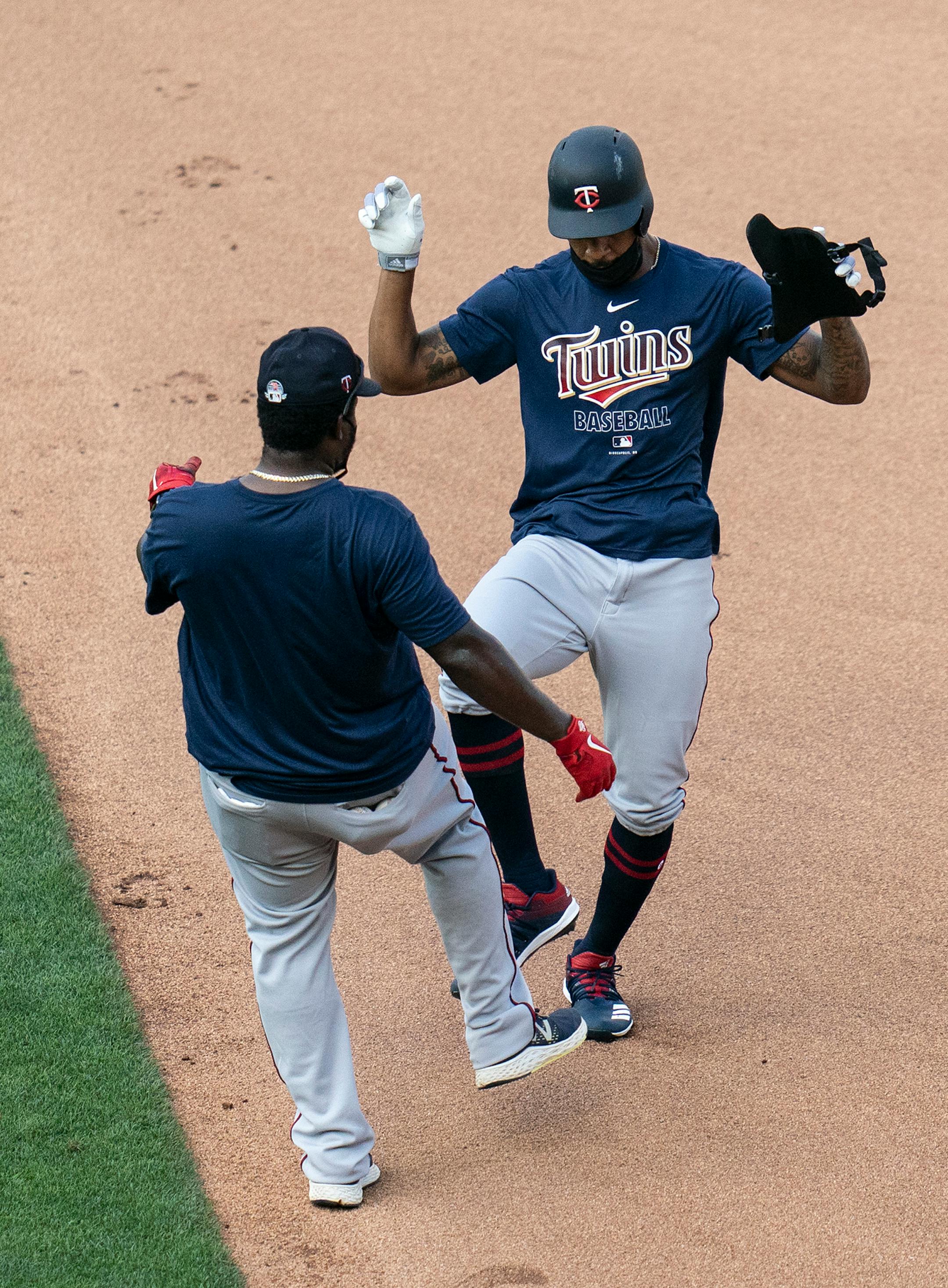 Minnesota Twins center fielder Byron Buxton (25) gave a foot pat to a coach during practice at Target Field in Minneapolis, Minn., on Wednesday, July 8, 2020.