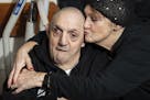 Sharon Gaiptman kisses her brother Lenny at his home in Philadelphia, Pa. (Jose F. Moreno/The Philadelphia Inquirer/TNS) ORG XMIT: 1540215