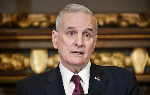 Governor Mark Dayton signed a broadly bipartisan bill that allows Minnesotans to recover their vehicle after someone else is convicted of driving it without their permission. He also answered questions about a variety of issues including health insurance funding. ] GLEN STUBBE &#xef; glen.stubbe@startribune.com Monday, April 3, 2017