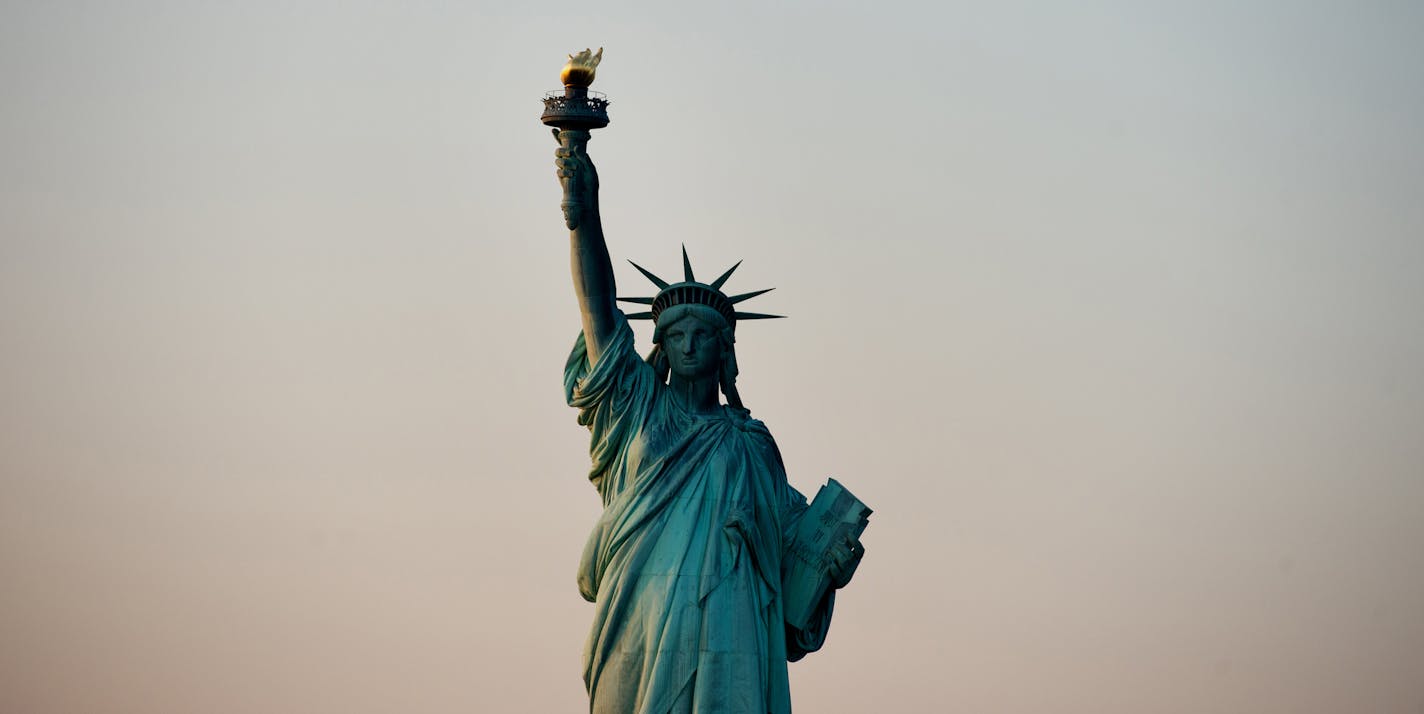 The Statue of Liberty stands in this aerial photograph. MUST CREDIT: Ron Antonelli/Bloomberg