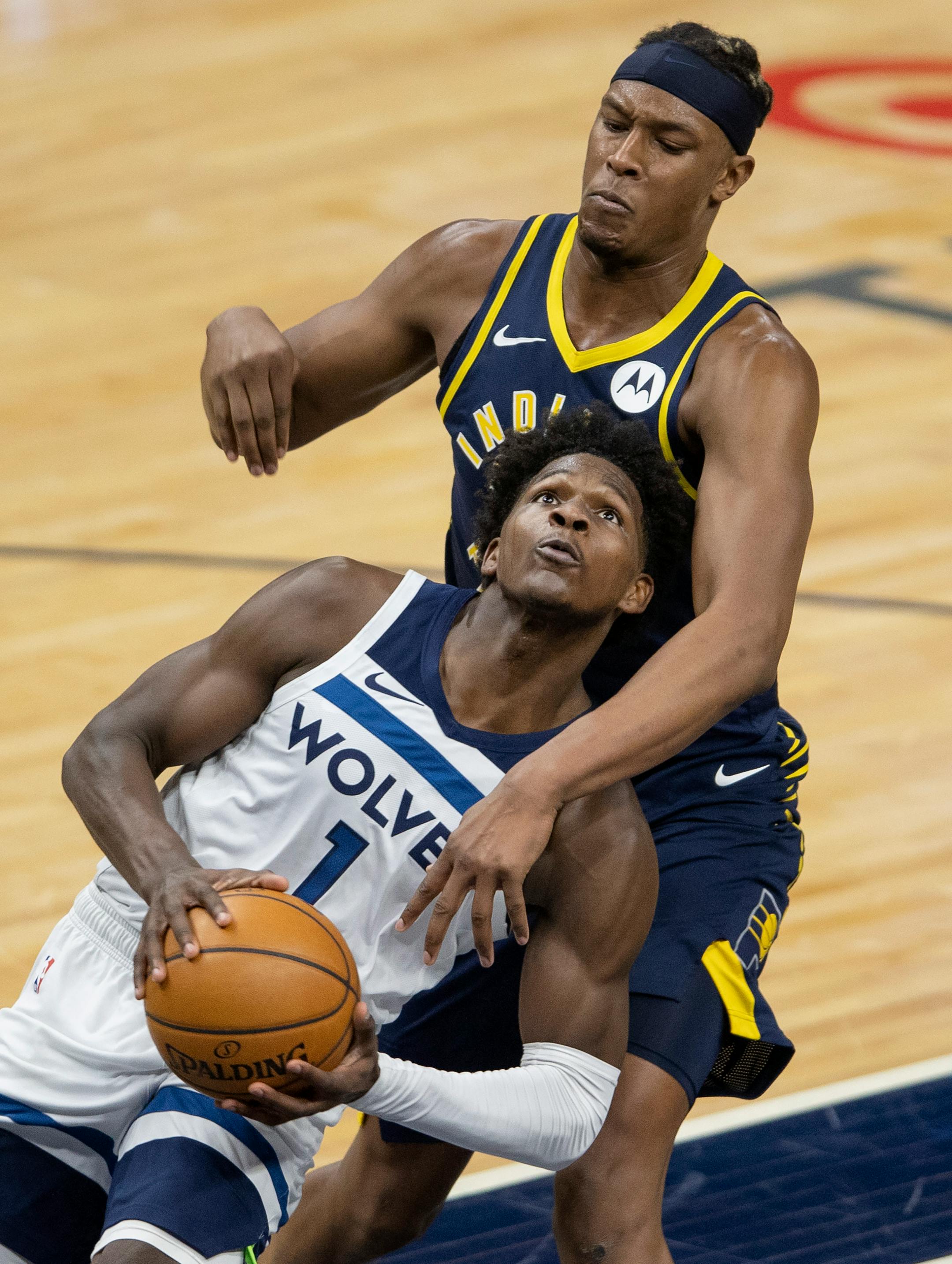 Minnesota Timberwolves Anthony Edwards (1) was defended by Myles Turner (33) of the Indiana Pacers in the third quarter.