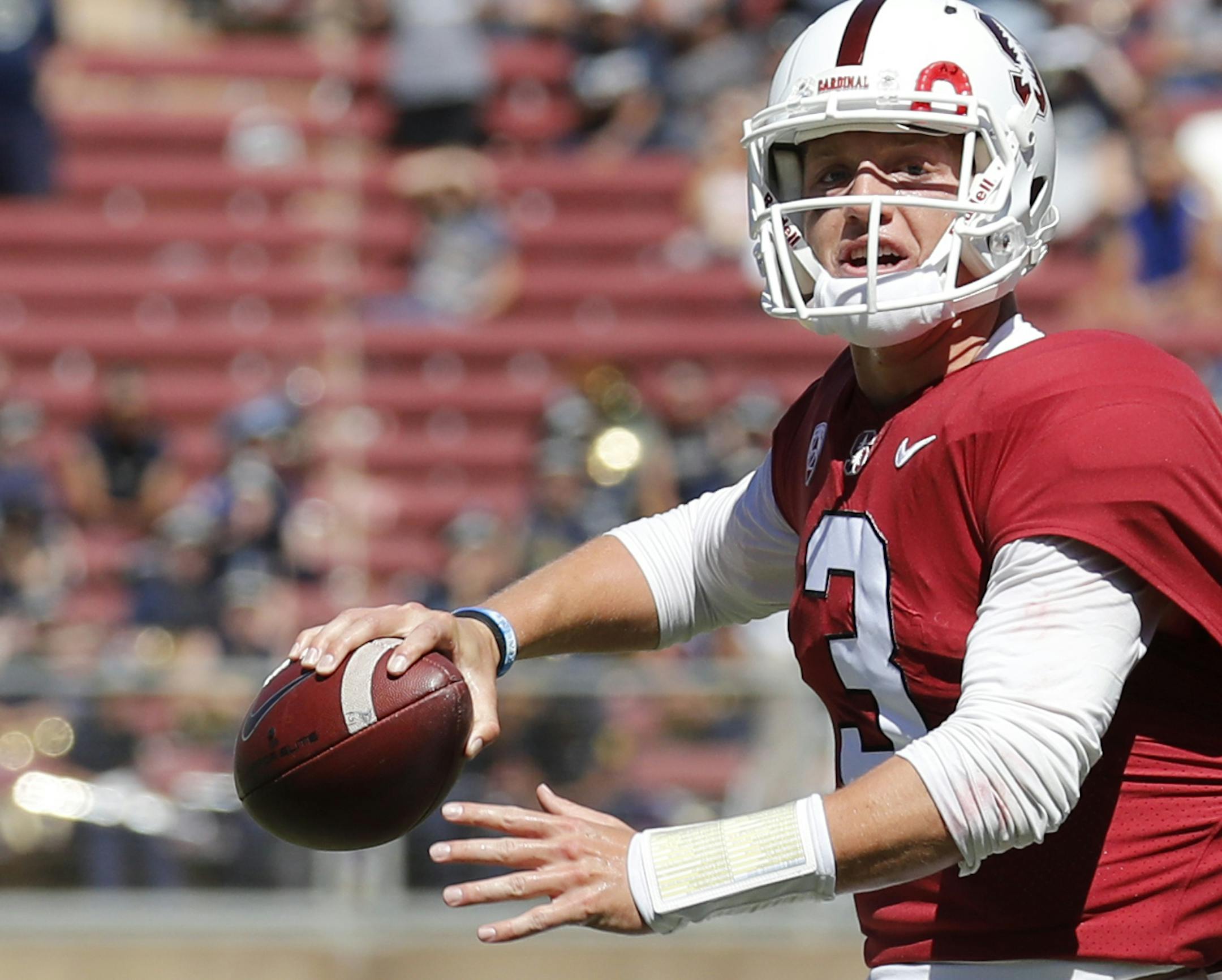 Stanford quarterback K.J. Costello is sacked by UC Davis linebacker Mason Moe (34) in the first half in an NCAA college football game in Stanford, Calif., Saturday, Sept. 15, 2018. (AP Photo/Jim Gensheimer) ORG XMIT: CAJG208
