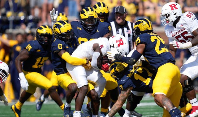Michigan’s defense swallowed up Rutgers running back Kyle Monangai during the Sept. 23 game in Ann Arbor.
