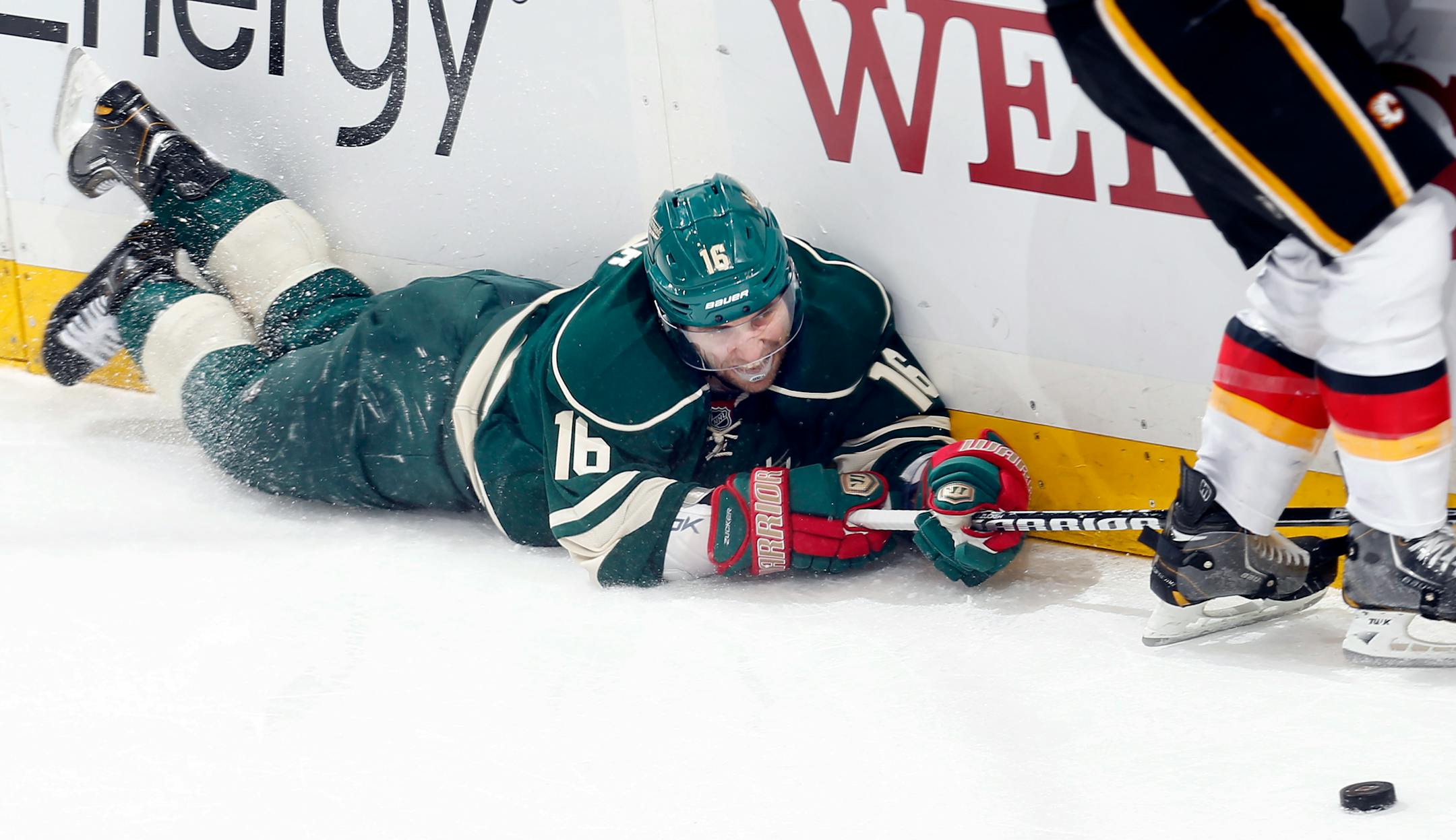 Jason Zucker (16) reached out for the puck in the second period. Calgary beat Minnesota by a final score of 4-1. ] CARLOS GONZALEZ cgonzalez@startribune.com April 21, 2013, St. Paul, Minn., Xcel Energy Center, NHL, Minnesota Wild vs. Calgary Flames