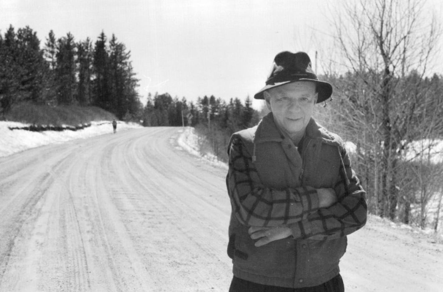 May 4, 1990 Robert Treuer, Bemidji are writer and tree farmer, stands near his property on Beltrami County Road 51, which serves 14 families. The county plans to spend $380,000 to improve the 2.1 - mile road, including a realignment to the left of the picture to increase the distance from the pond on the right. May 5, 1990 Robert Treuer, a tree farmer in Bemidji, stood near his land on Beltrami County Rd. 51 in April. The state is spending $380,000 to repair the road. Robert Franklin, Minneapoli