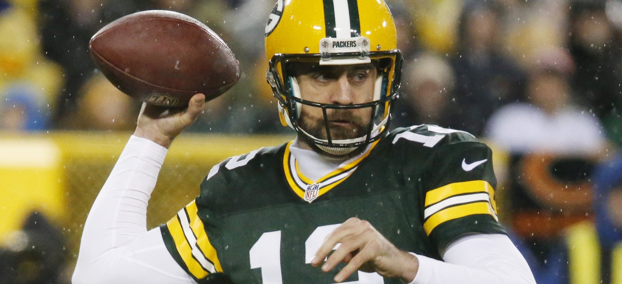 Green Bay Packers' Aaron Rodgers drops back to pass during the first half of an NFL football game against the Chicago Bears Thursday, Nov. 26, 2015, in Green Bay, Wis. (AP Photo/Mike Roemer)