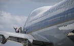 FILE -- President Donald Trump waves as he boards Air Force One in Atlanta, April 28, 2017, a VC-25A (Boeing 747-200B), one of two that presidents dat
