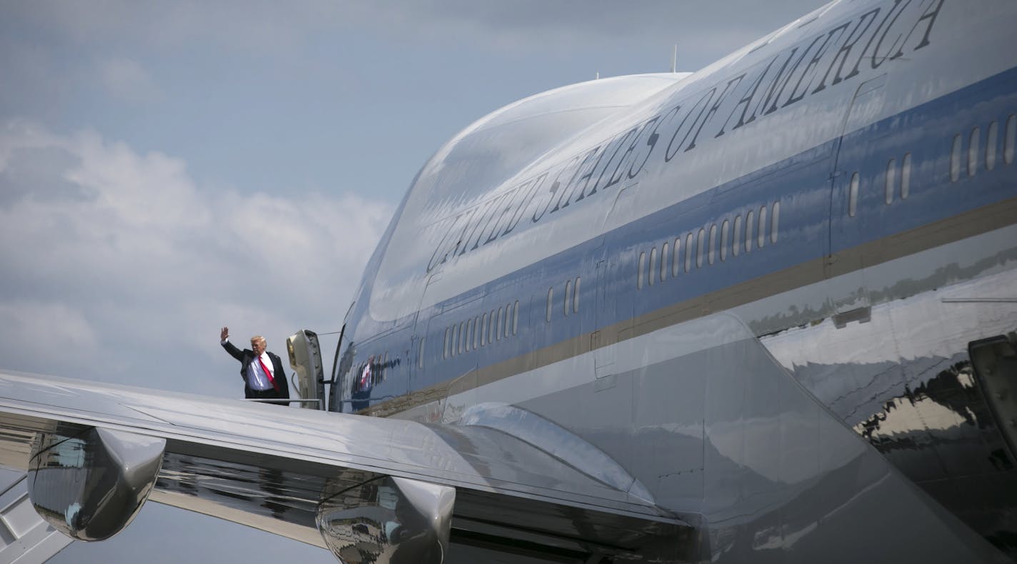 FILE -- President Donald Trump waves as he boards Air Force One in Atlanta, April 28, 2017, a VC-25A (Boeing 747-200B), one of two that presidents dating back to the first George Bush have used for travel. Eight months into Trump&#x2019;s tenure, several public officials have faced criticism for using military planes and chartered aircraft. Here are some of the fleet of aircraft, flown by the Air Force, that whisks America&#x2019;s leaders from one corner of the globe to the other. (Al Drago/The