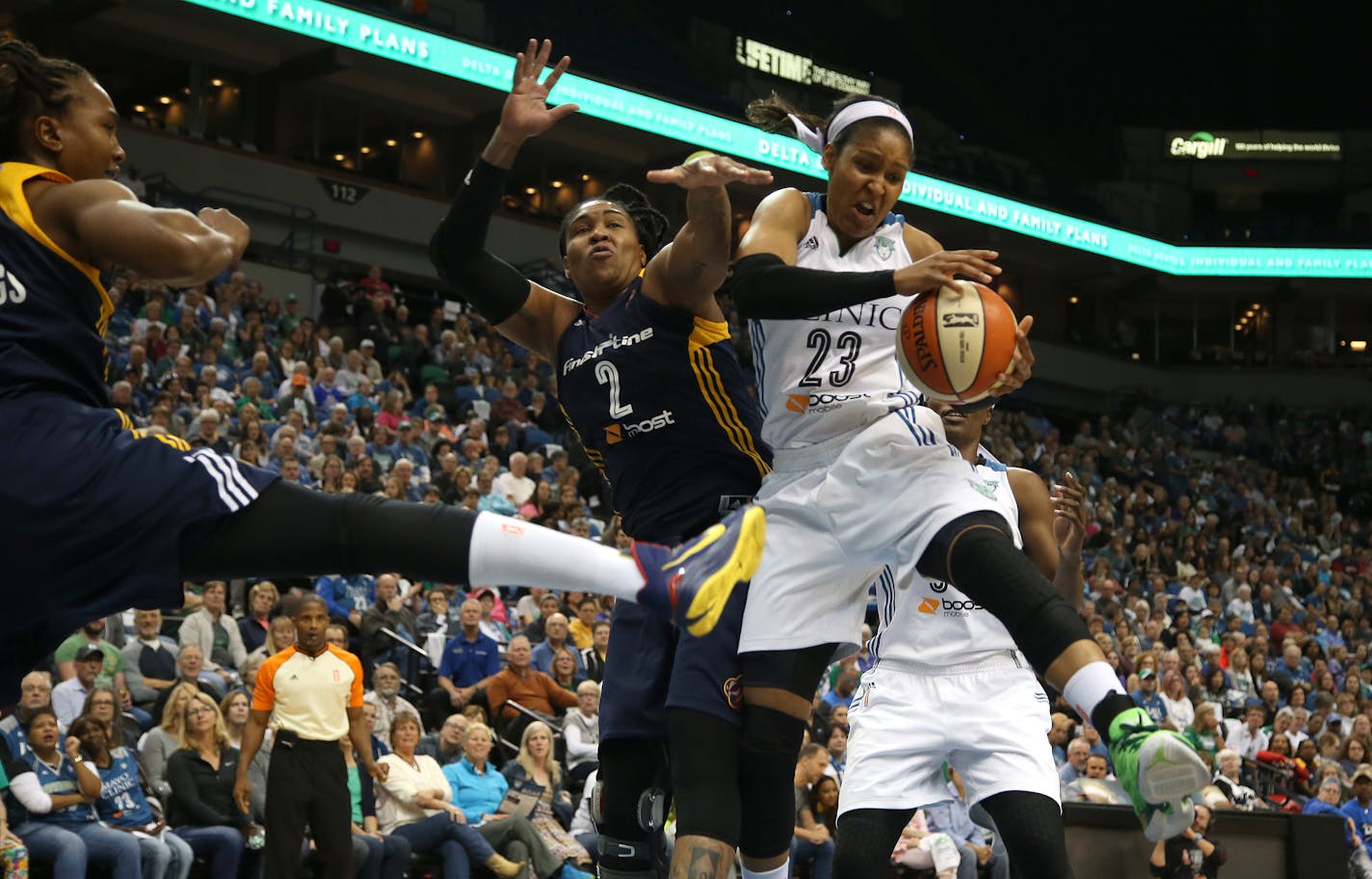 Indiana's Erlana Larkins defended against Maya Moore during the first half in Game 1 of the WNBA Finals on Sunday afternoon.