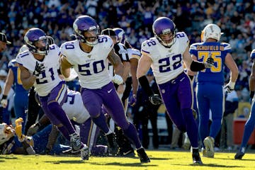 Vikings safety Harrison Smith celebrated after recovering a fumble vs. the Chargers in Los Angeles.