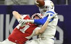 SMB Wolfpack defensive back Trevon Howard (25) was called for pass interference while breaking up a pass intended for Willmar wide receiver Ty Roelofs